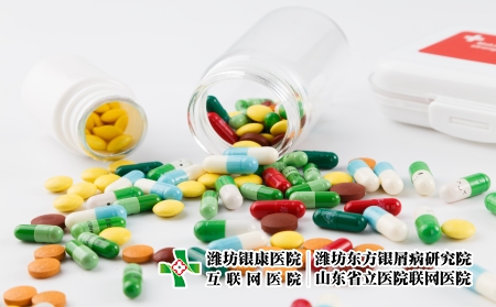 攝圖網_500217212_各種顏色彩色的藥片和膠囊（企業商用）