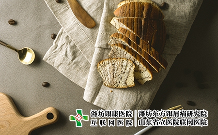 攝圖網(wǎng)_500601411_餐桌上的面包與餐具（企業(yè)商用）飲食